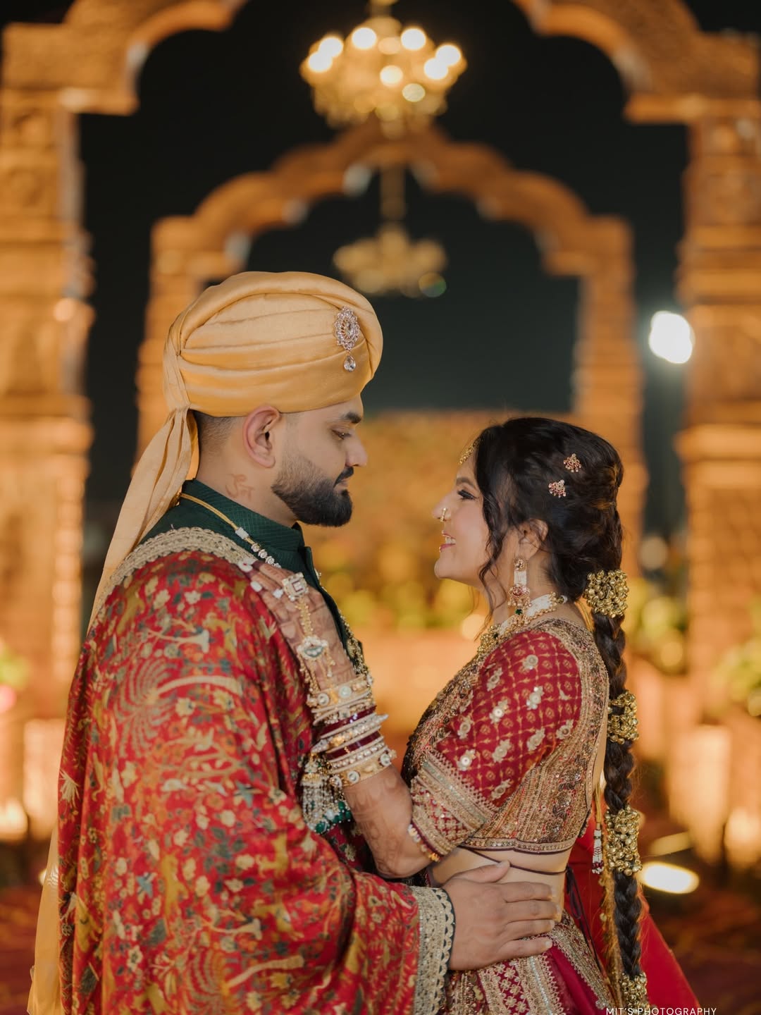 Bride and groom wedding look styled by professional bridal makeup artist in Alkapuri, Vadodara, featuring elegant bridal makeup and traditional attire.